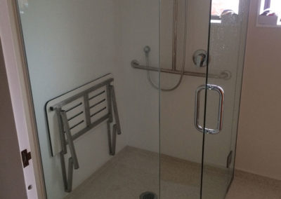 Frameless shower that has been made for people with special needs.